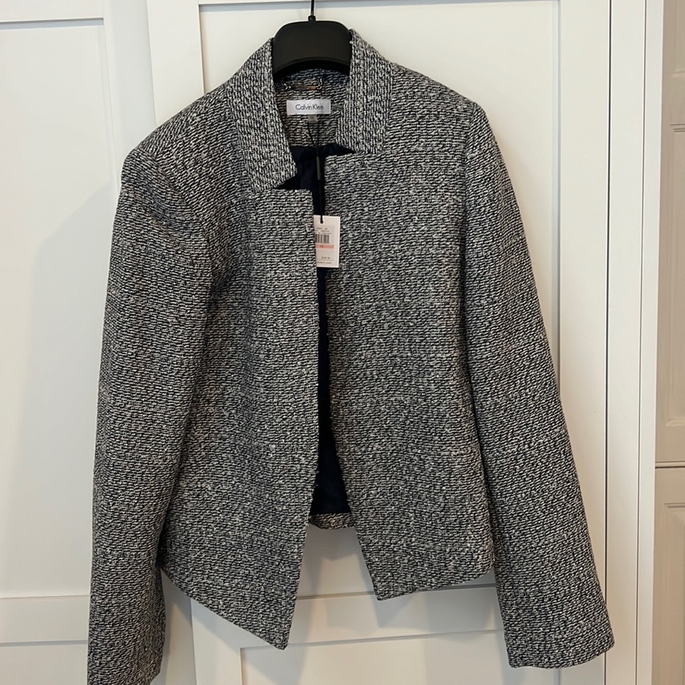 Calvin Klein blazer. New with tags. Color blue. Size 10.
